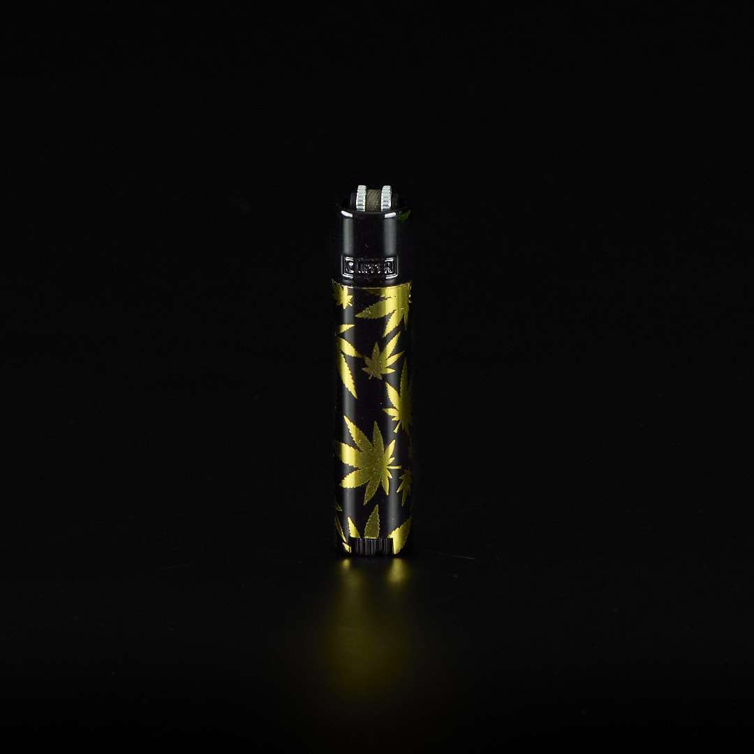 Mechero Clipper de metal Hojas Doradas